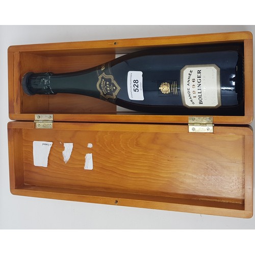 637 - A bottle of Bollinger champagne, 1996, two other bottles of Bollinger champagne, two bottles of Harr... 