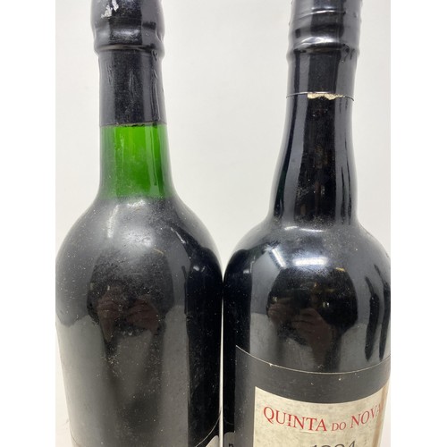 703 - A bottle of Cockburn's vintage port, 1967, and three other bottles of port (4)