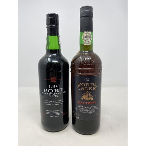 703 - A bottle of Cockburn's vintage port, 1967, and three other bottles of port (4)