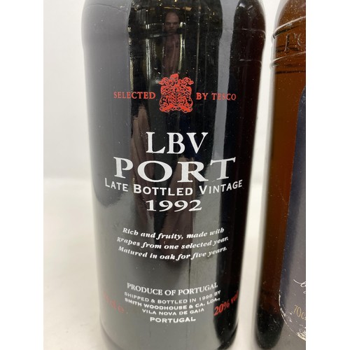 703 - A bottle of Cockburn's vintage port, 1967, and three other bottles of port (4)