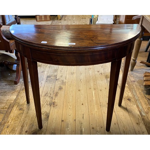 953 - A 19th century mahogany demi-lune folding card table, 92 cm wide