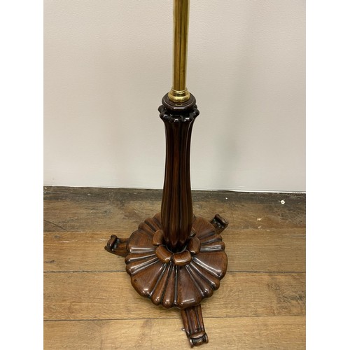 956 - A rosewood and brass music stand, with a lyre rest, 35 cm wide