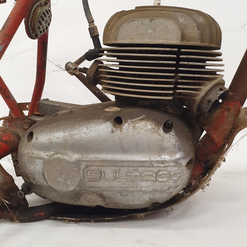 74 - A red painted frame, with a Bultaco engine