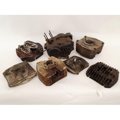 81 - A Fantic engine, bottom half, and assorted Fantic cylinder heads