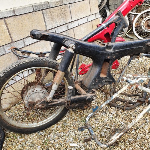 29 - A black painted frame, two Honda Cub frames, and other items (qty)...