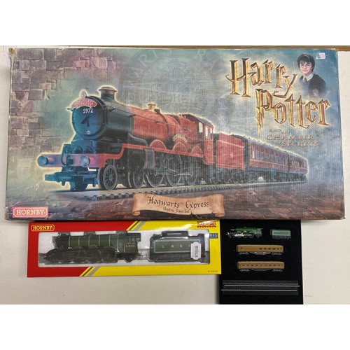 206 - A Hornby OO gauge 4-6-2 locomotive and tender, boxed, a Harry Potter electric train set, and a Mini ... 