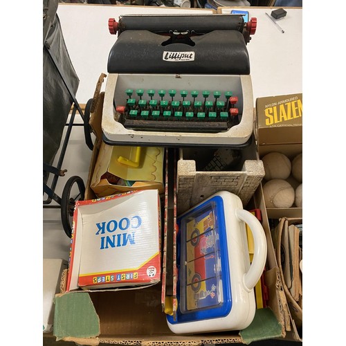 211 - A set of six 1970s Slazenger tennis balls, boxed, and various toys and games (qty)