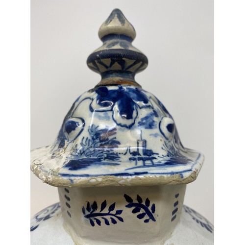 467 - A Delft vase and cover, 38 cm high, and another, 36 cm high (2)