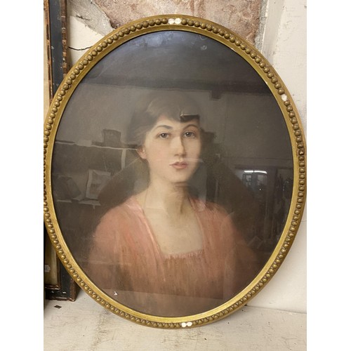 647 - English school, early 20th century, a head and shoulders portrait of a young lady wearing a pink dre... 