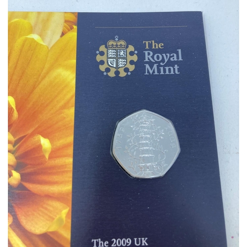 118 - A Royal Mint Kew Gardens 2009 brilliant uncirculated 50p coin, in a wallet