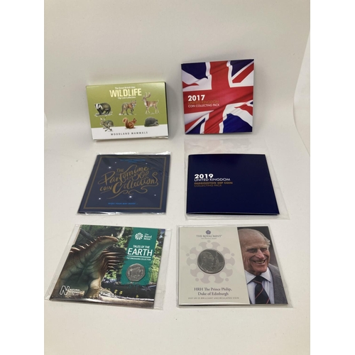 124 - A Royal Mint Paddington Bear 50p coin collection set, 2019, and other assorted coins