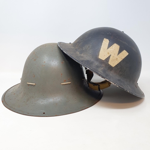 195 - A WW2 wardens helmet, another, and a box (box)