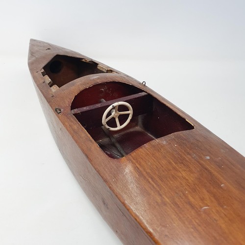 208 - A 1950's wooden toy boat by Kellner, and a treen pull along dog (2)