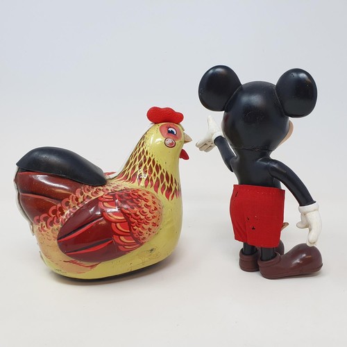 209 - A Chinese tinplate battery powered chicken toy, and a model of Mickey Mouse (2)