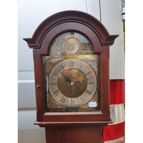 911 - A longcase clock, in a mahogany case, 162 cm high, a TV cabinet, and a pine chest (3)