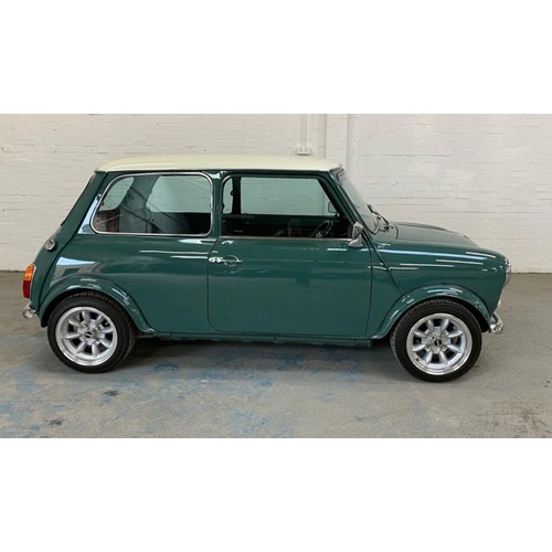 14 - 1971 Mini Cooper S Recreation
Registration number KFB 656J
Green with a white roof
Black interior
Me... 