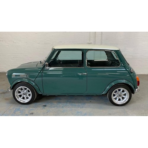 14 - 1971 Mini Cooper S Recreation
Registration number KFB 656J
Green with a white roof
Black interior
Me... 