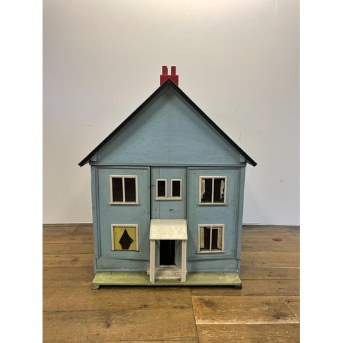 240 - A 1950s dolls house, 105 cm high x 83 cm wide