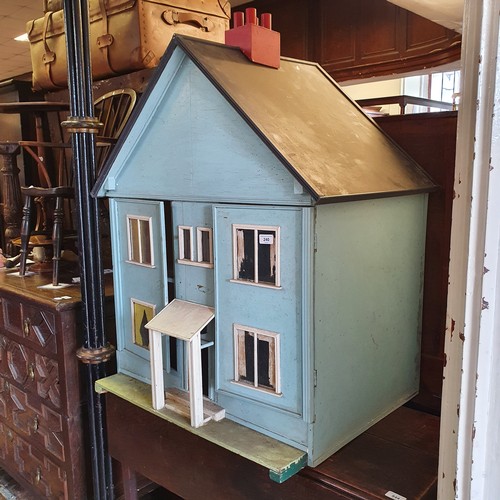 240 - A 1950s dolls house, 105 cm high x 83 cm wide