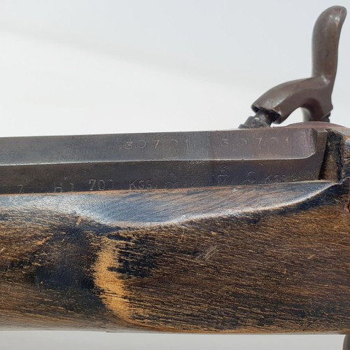 200A - A percussion cap pistol, with a beech stock, 38 cm, another similar, rusted, 18 cm, and a small shot... 