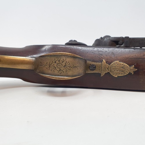 201A - A late 18th/early 19th century flintlock pistol, signed H NOCK, hammer broken, rust to barrel, wood ... 