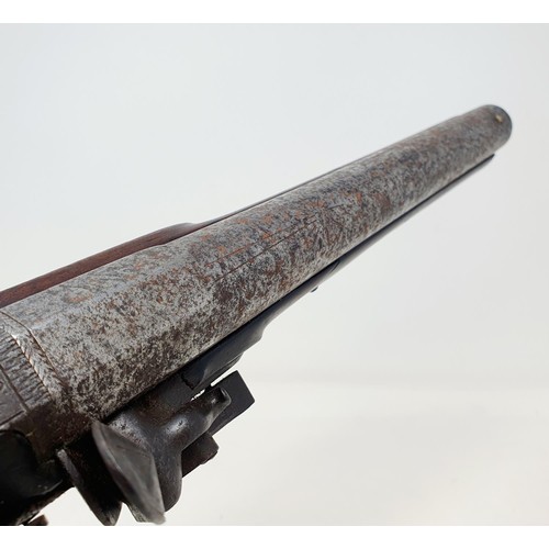 201A - A late 18th/early 19th century flintlock pistol, signed H NOCK, hammer broken, rust to barrel, wood ... 