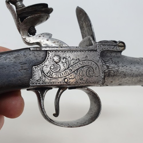 199A - A late 18th/early19th century flintlock pistol, signed Bumford Minories/London, attic stored, 18 cm