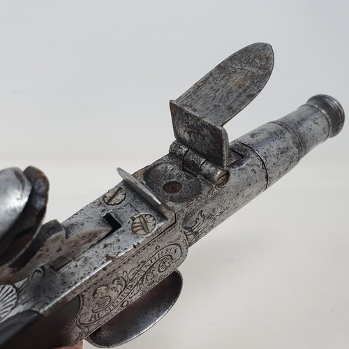 199A - A late 18th/early19th century flintlock pistol, signed Bumford Minories/London, attic stored, 18 cm