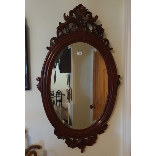 178 - A Victorian style wall mirror, 120 x 68 cm, another mirror and other pictures (all hanging in the ha... 