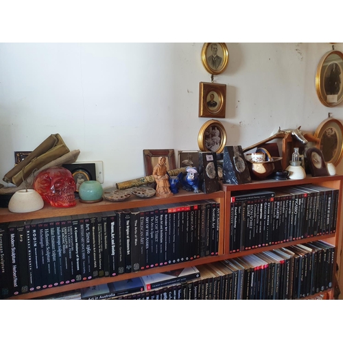 180 - The Study.
A pair of fossil type bookends, 15 cm high, a turned wood bowl, and sundries