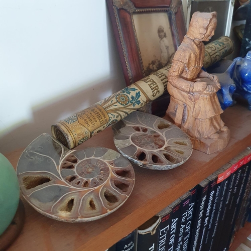 180 - The Study.
A pair of fossil type bookends, 15 cm high, a turned wood bowl, and sundries