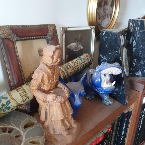 180 - The Study.
A pair of fossil type bookends, 15 cm high, a turned wood bowl, and sundries