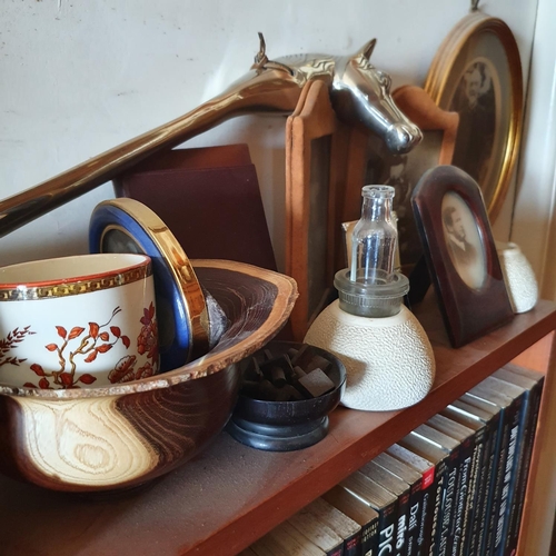 180 - The Study.
A pair of fossil type bookends, 15 cm high, a turned wood bowl, and sundries