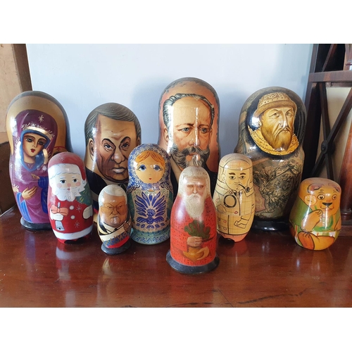 184 - A group of ten Russian stacking dolls, the largest 25 cm high