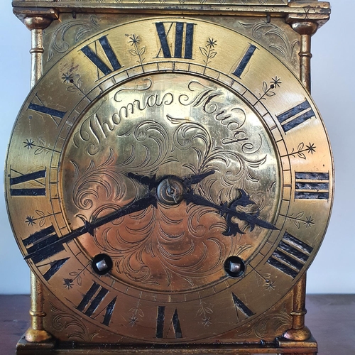 187 - A 17th century style lantern clock, the 16 cm diameter chapter ring with Roman numerals, the centre ... 