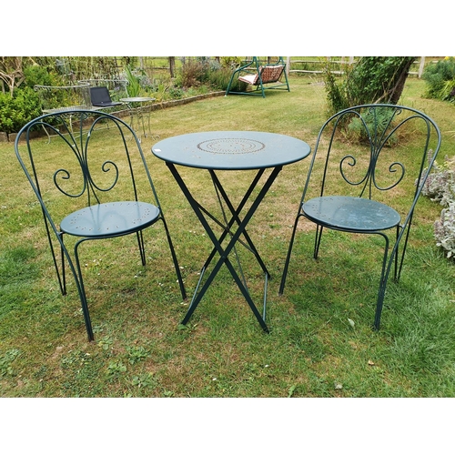 20 - A garden/bistro type painted metal table, with a matching pair of chairs (3)...