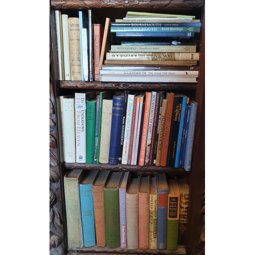 204 - Assorted books, including Bournemouth, in the carved oak breakfront bookcase (qty)