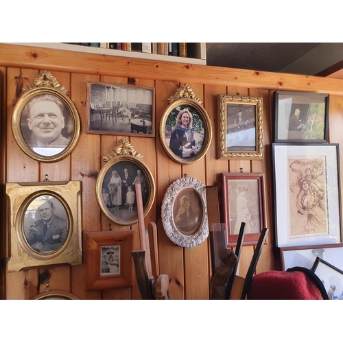 208 - The group of assorted pictures and photographs, as hanging on the walls in the study