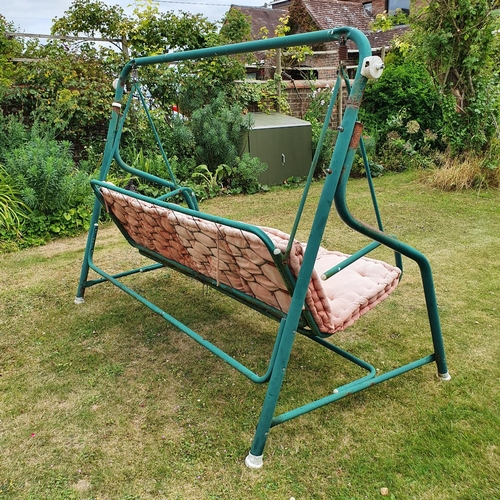 22 - A green painted garden swing, some surface rust and cushions faded...