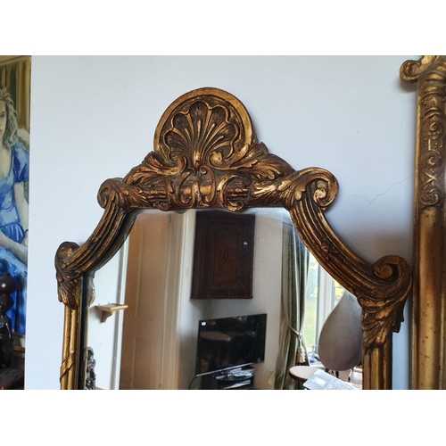 223 - A wall mirror, in a gilt frame, 100 x 44 cm, and another similar, 67 x 39 cm (2)