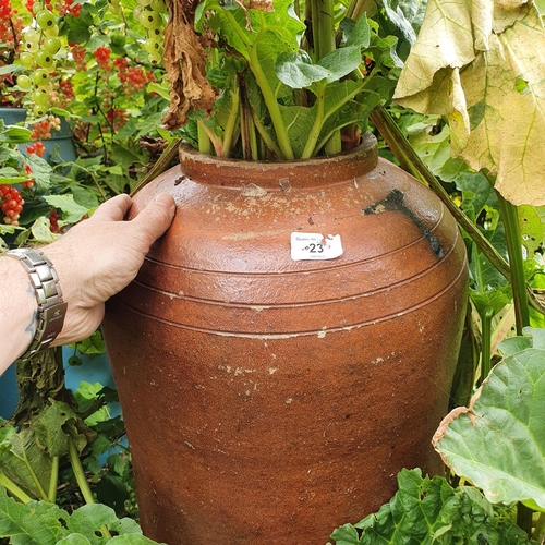 23 - A salt glazed pottery rhubarb forcing pot, and cover, approx. 66 cm high...