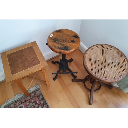 240 - Two revolving stools, and a modern occasional table (3)