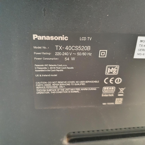 243 - A Panasonic LCD TV TX - 40CS520B, on a stand with a Sky box