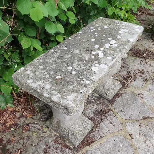 43 - A reconstituted stone garden bench, on figural bird supports, 96 cm wide...