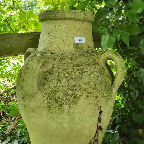 49 - A pottery amphora vase, 72 cm high, and an earthenware garden rabbit (2)...