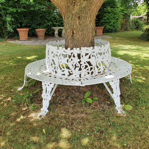 51 - A Victorian style painted cast metal tree bench, decorated grapes and foliage...