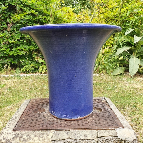 52 - A large blue glazed garden pot, 60 cm high...