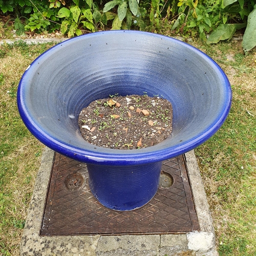 52 - A large blue glazed garden pot, 60 cm high...