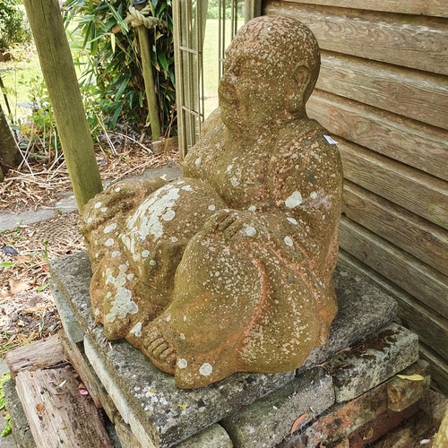 60 - A terracotta figure of a buddha, hollow, approx. 53 cm high