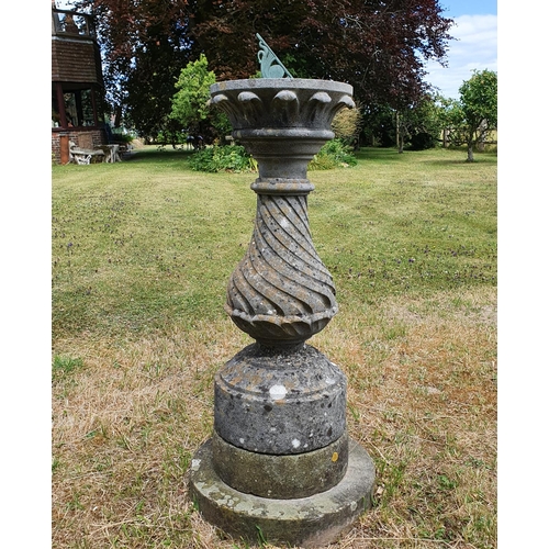 66 - A garden sundial, on a reconstituted stone plinth and base, approx. 118 cm high